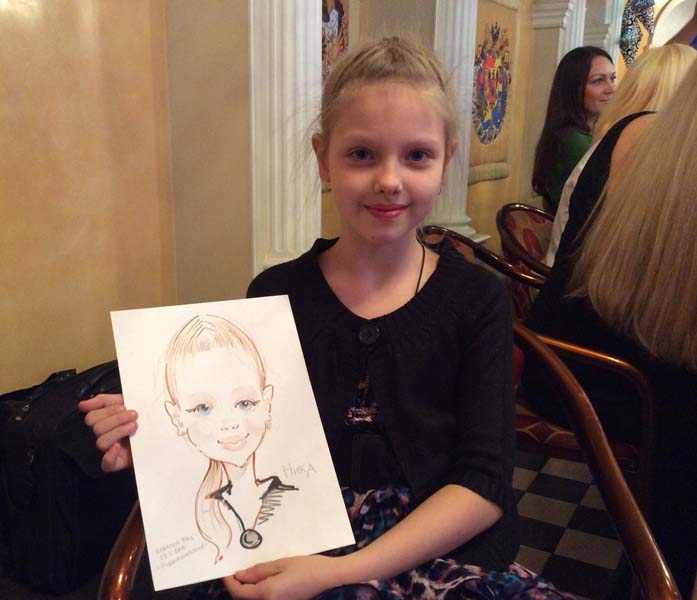 Ника показывает свой шарж на свадьбе в 